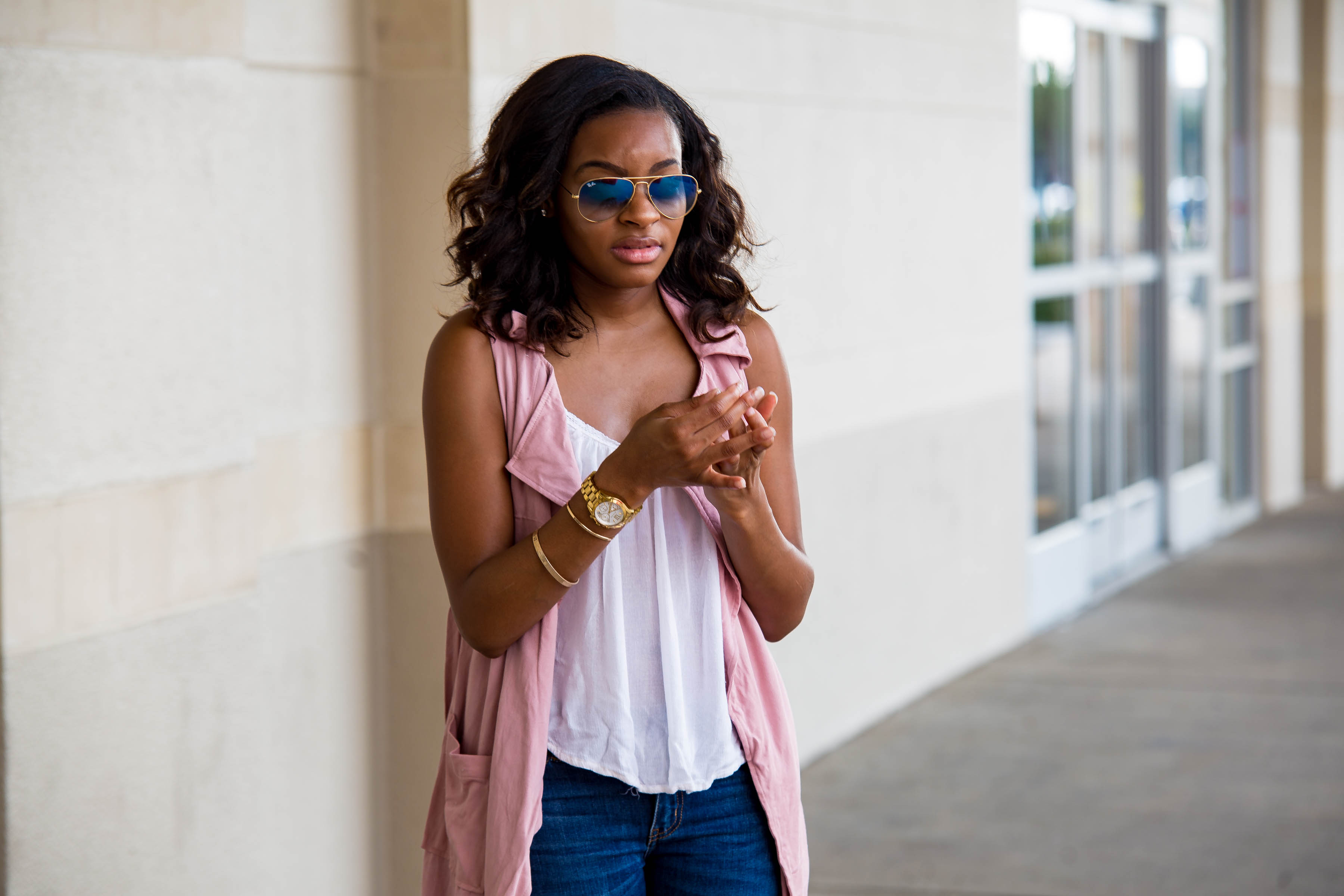 pink vest and white top